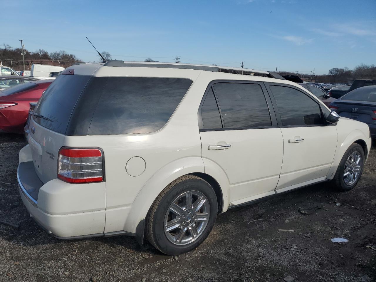 2009 FORD TAURUS X L - 1FMDK06WX9GA01485